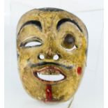 A Chinese painted face mask.