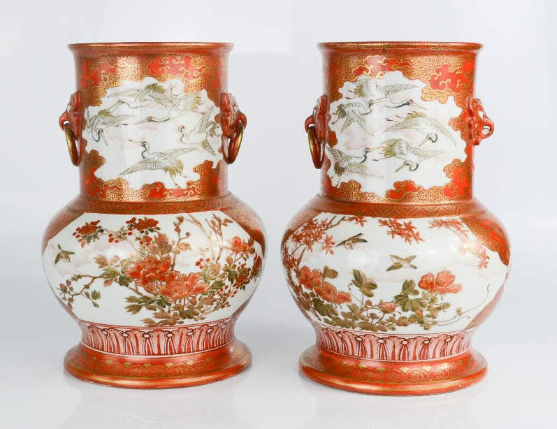 A pair of Japanese vases with calligraphy mark to the base.