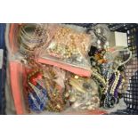 A quantity of costume jewellery, to include pearl necklace, bangles, earrings etc.