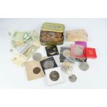 A quantity of commemorative and other coins, bank notes and antique coins.