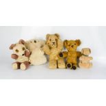 Two early 20th century teddy bears, koala bear, and two others.
