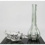 A retro glass bud vase, 22cm high, together with a dish in the form of a vine leaf.