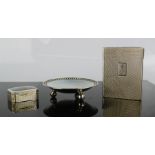 Objects of virtue, including a silver and enamelled bowl, silver box photograph frame, machine