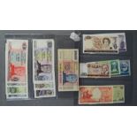 Bank notes: New Zealand, Dutch, Indonesian, Argentina examples.