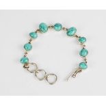 A silver and turquoise bracelet, 0.79toz.