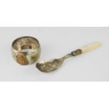 A silver and mother of pearl jam spoon together with a HMS Nelson napkin ring.