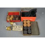 A group of collecatables to include Murex goggles, tins, draught sets, Sherwoods oil burner wicks.