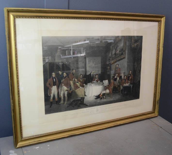 The Melton Breakfast; a 19th century hand coloured print, in giltwood frame.