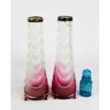 A pair of silver and glass rose vases, in graduated cranberry, 21cm high.