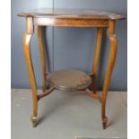 A mahogany occasional table, with shaped top.