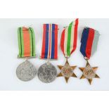 A group of medals: the Italy 1939 -45 Star, the Defence medal and the 1939-1945 War Medal.