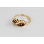 A 9ct gold, diamond and oval cut paste ring, size P, 3.2g.