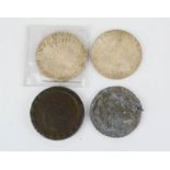 Two 1780 M Theresia coins and two further coins.