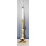 A gilt metal table lamp, with reeded column, 120cm high.