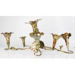 A silver plated epergne in the form of leaves.