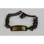 An early 19th century iron dog collar.