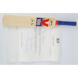 A miniature cricket bat signed by the former Prime Minister John Major, dated 1995, 38cm high.