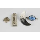 A silver ingot pendant, locket and brooches, 1.25toz.