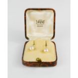 A pair of silver and pearl earrings, in the original Lotus Pearls box.