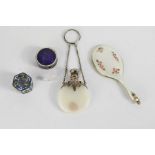Objects of virtue, including an enamel box containing a miniature glass pig, a silver Chinese box, a