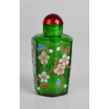 A Chinese green glass scent bottle, painted with flowers.