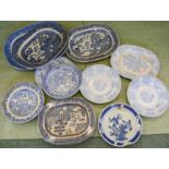 A selection of blue and white dinner plates and meat plates, to include 19th century Willow