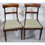 A set of three mahogany framed dining chairs with drop in upholstered seats, together with a 19th