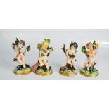 Four Capodimonte cherub figures.