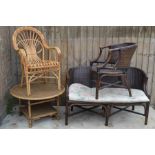 A wicker coffee table and matching seat together with two conservatory chairs.