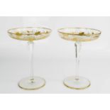 A pair of gilt crystal dessert glasses.