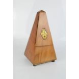 A French mahogany cased metronome, 23cm high.