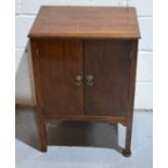 A small 1950s cupboard with two doors.