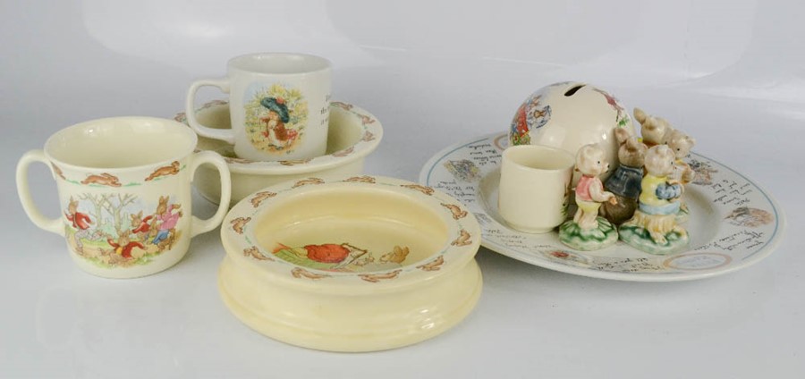 A quantity of Bunnykins, one Royal Doulton example, with plates, cups and figures.