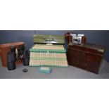 A 19th century brass clad box, sewing basket, green tin box, binocular and camera.