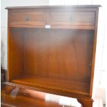 A small bookcase, with drawers.