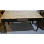 A Victorian pine kitchen table with green painted turned legs, 73 by 72 by 153cm.