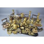 A group of brassware to include plated candlesticks, blow torch, three flat irons, horse brasses