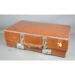 A vintage leather and chrome suitcase.