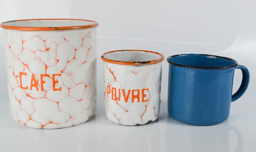 Two French enamel jars; Cafe, Poivre and a blue enamel jug.