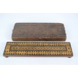 Two antique cribbage boards.