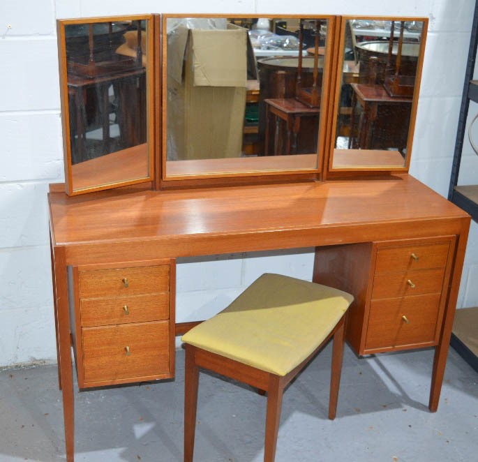 A retro dressing table with Heal's matching stool.