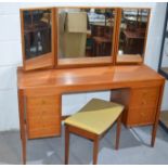 A retro dressing table with Heal's matching stool.