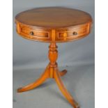 A side table, small circular top occasional table and a drum table.