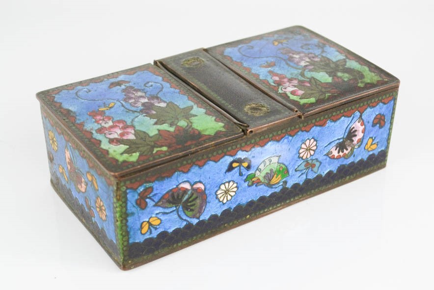 A Chinese cloisonne foil enamelled twin compartment copper tea caddy.