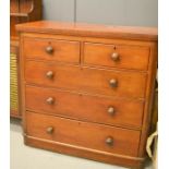 A Victorian mahogany chest of drawers, two short over three long drawers.