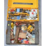 A yellow tool box with contents, together with a group of items including oil can, AA badge, and