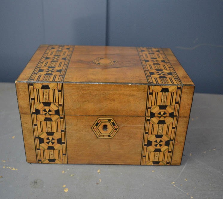 A 19th century parquetry work box.