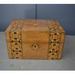 A 19th century parquetry work box.