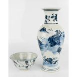 A blue and white Chinese vase, 25cm high together with an early blue and white rice bowl.