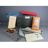 A New Dawn laundry box containing scarves, bag etc.